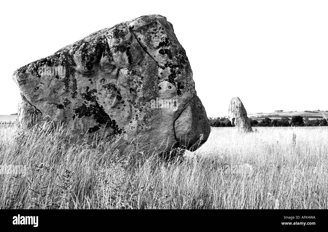 Prehistoric The Longstones (Adam and Eve) in black and white, Avebury, Wiltshire, England, UK Stock Photo