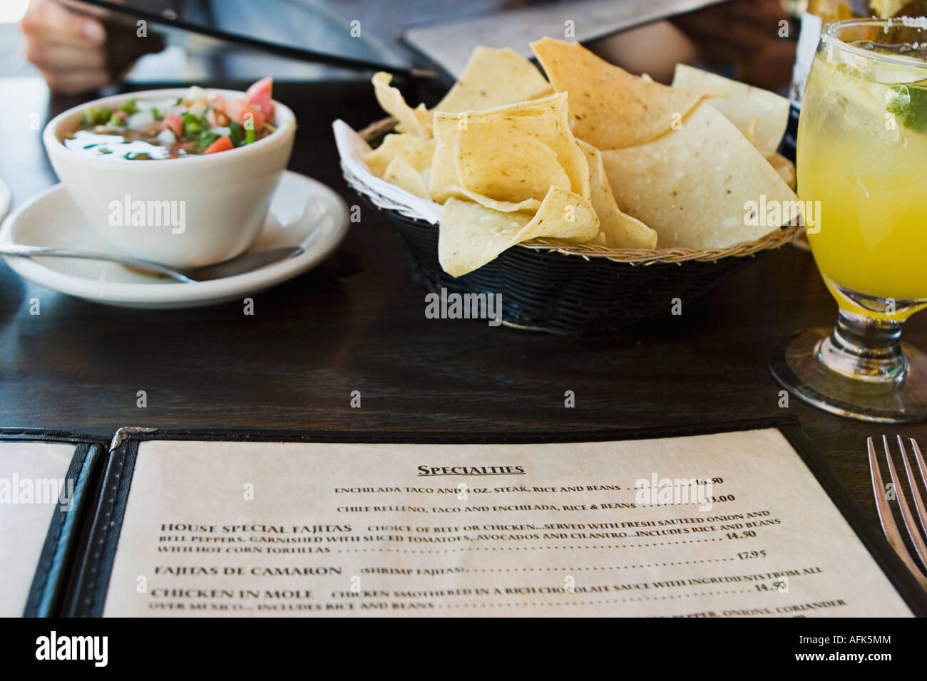 Menu on table at Mexican restaurant. Stock Photo