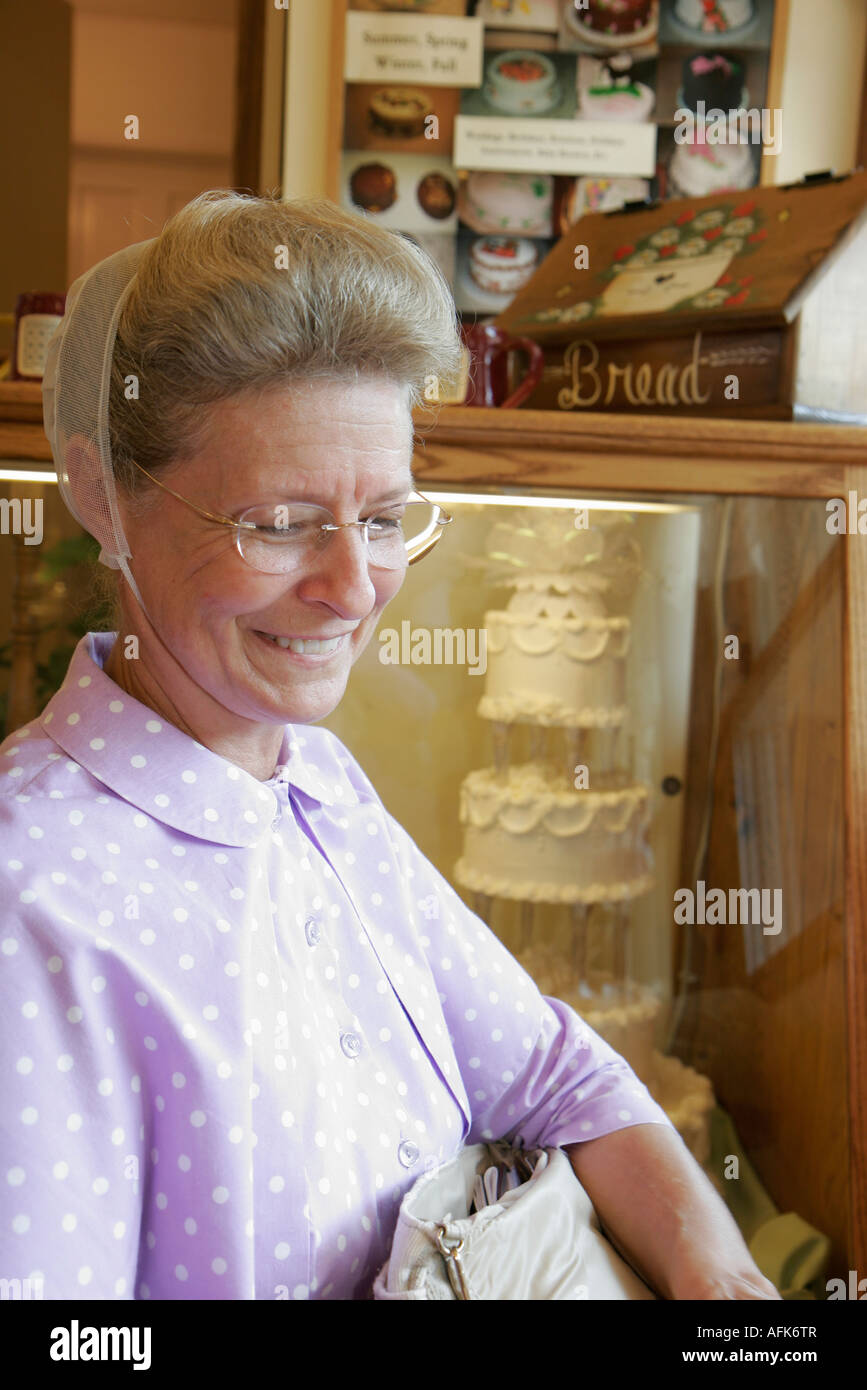 Smiling mennonite woman hires stock photography and images Alamy
