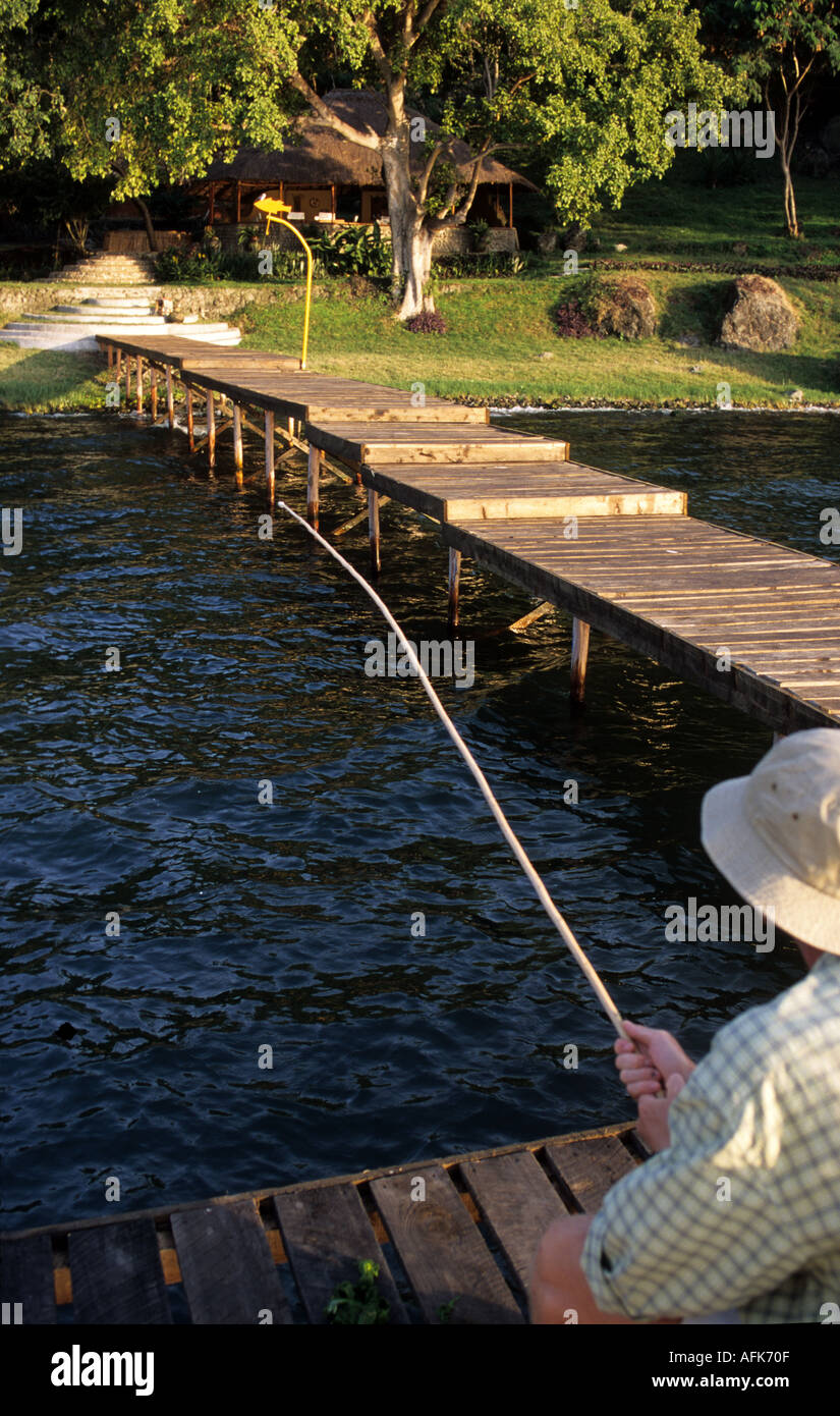 Fishing for tilapia from the jetty Mfangano Lodge Mfangano Island Lake