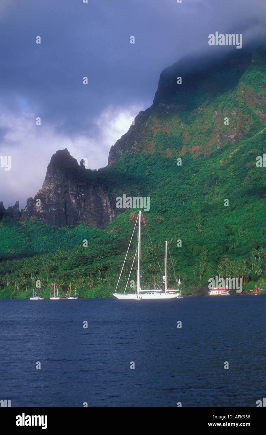 Boats at anchor in Cooks Bay on the island of Moorea in Tahiti French Polynesia South Pacific Ocean Stock Photo
