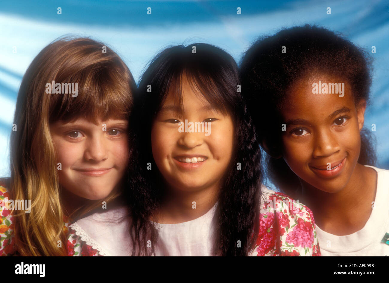 Caucasian Asian and African American girls Model Released Image Stock Photo