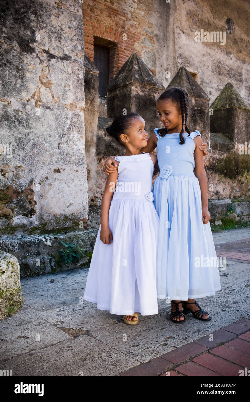 Two children arms around each other hi-res stock photography and images ...