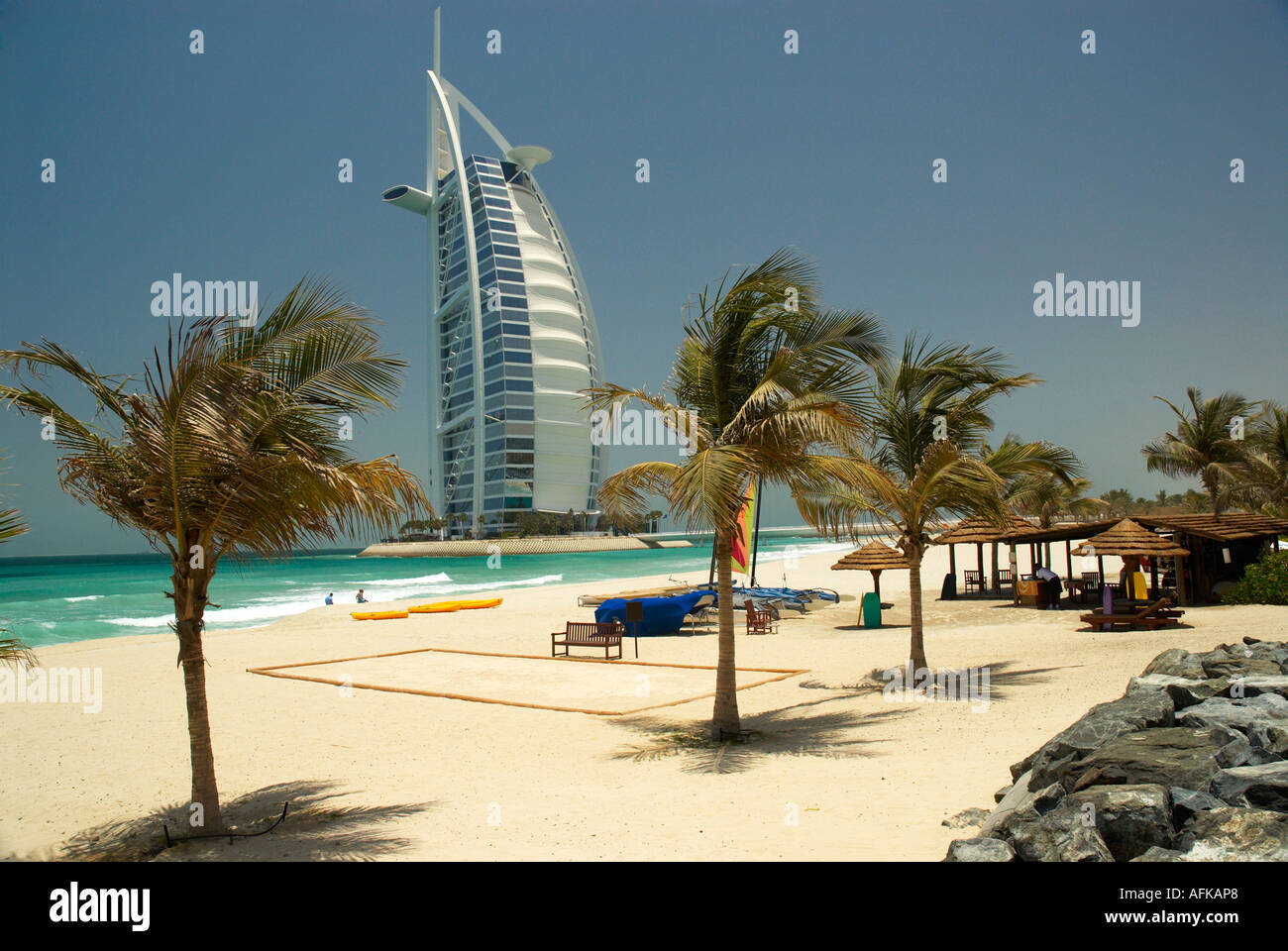 The Burj Al Arab Hotel With Palm Tree Lined Beach Dubai