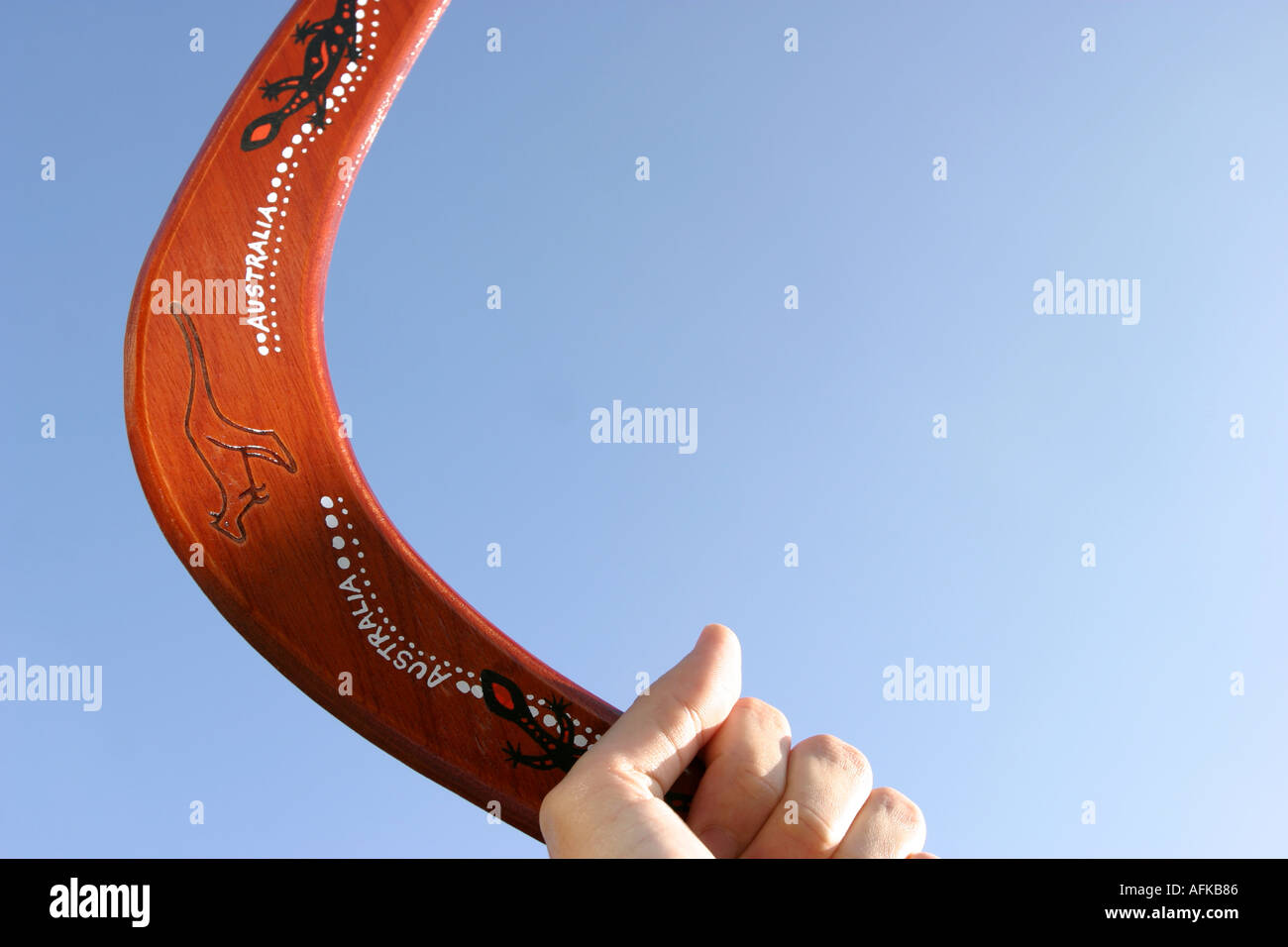 Boomerang and hand Stock Photo