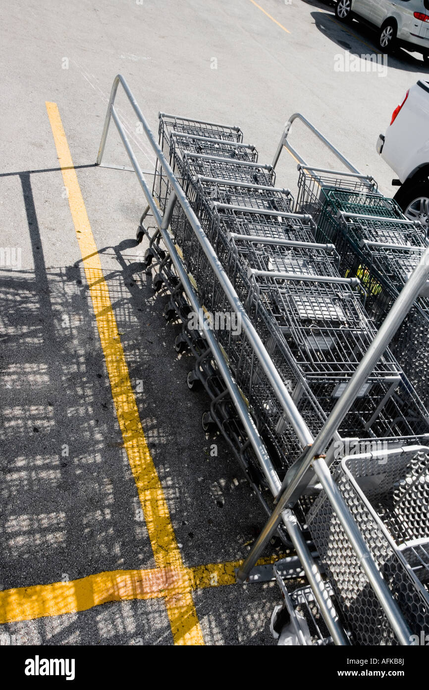 Shopping carts in parking lot Stock Photo Alamy