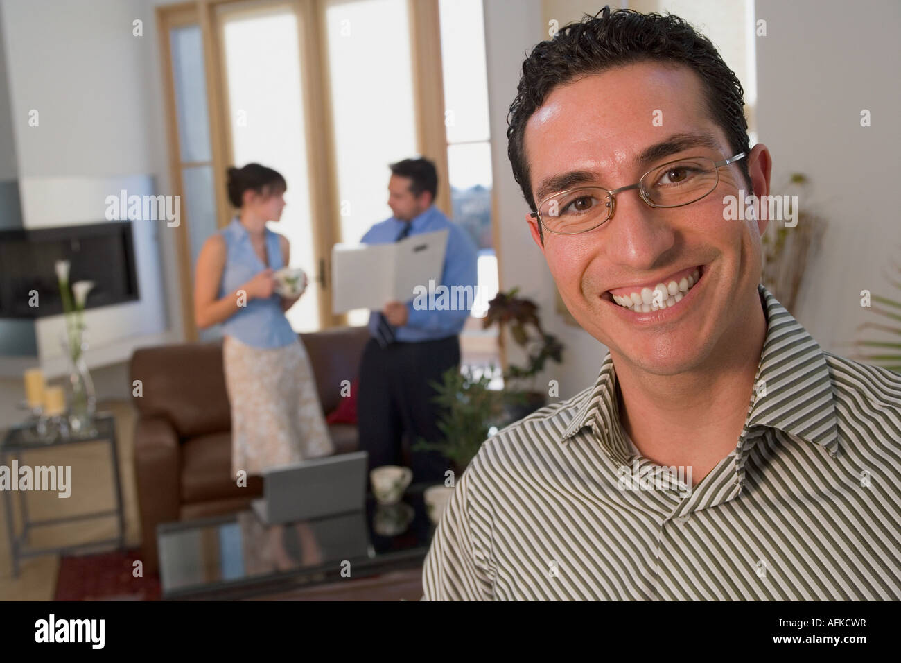 Portrait of a mid adult man smiling with a young woman Stock Photo - Alamy