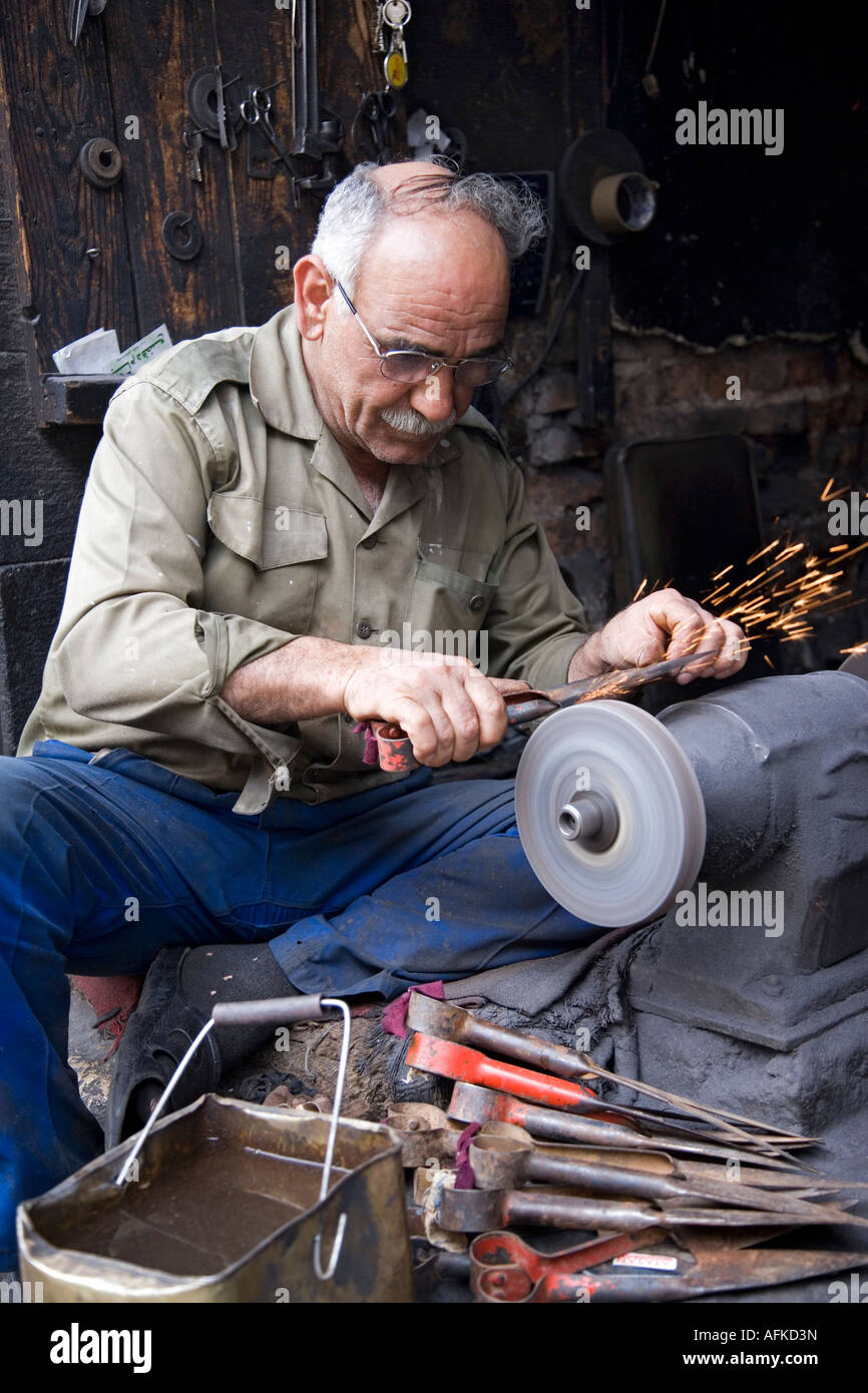 Sharpening knives in the Old City, Damascus Stock Photo Alamy