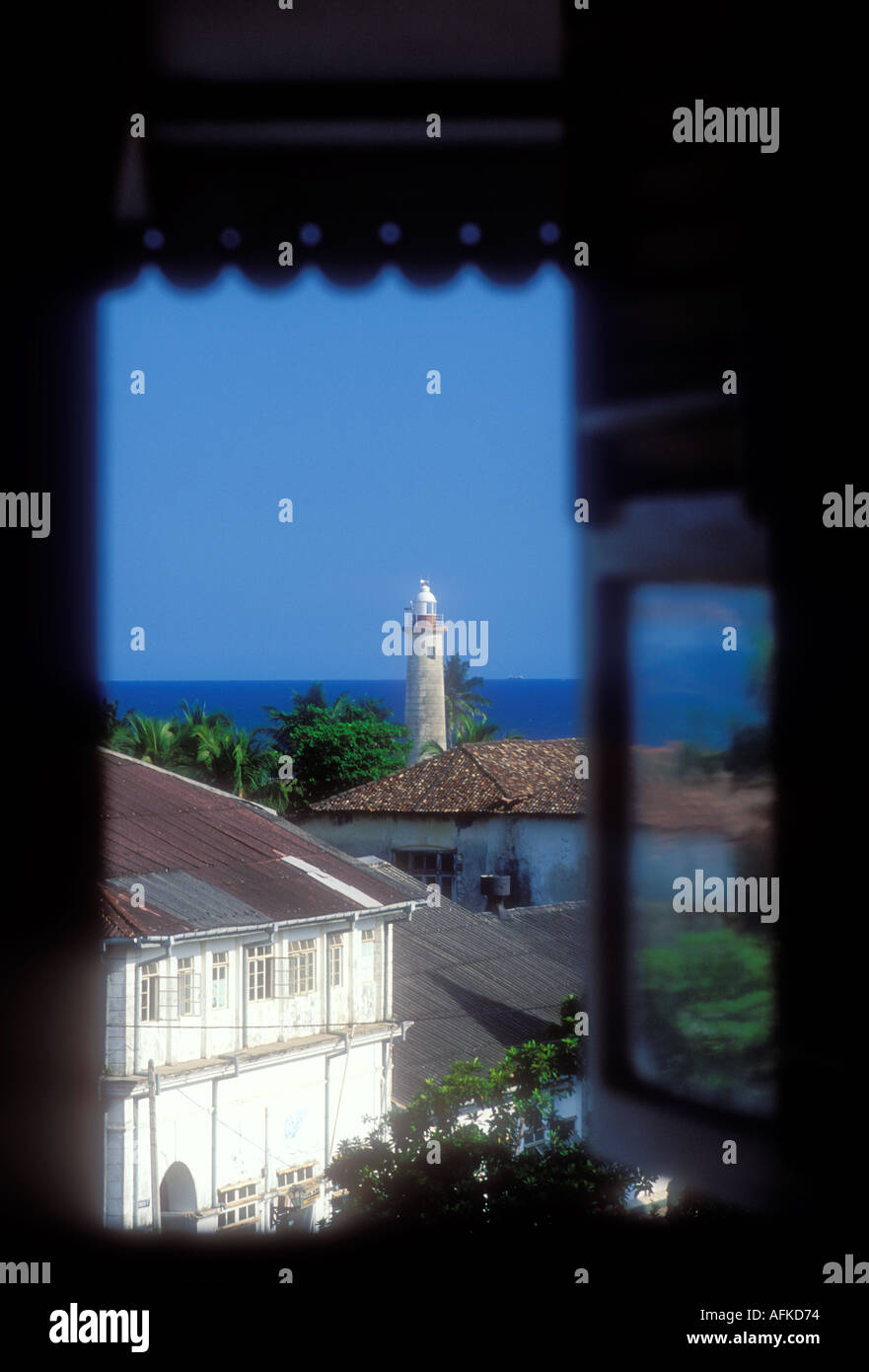 View out of window of the lighthouse in the port city of Galle along the South coast of Sri Lanka Indian Ocean Stock Photo