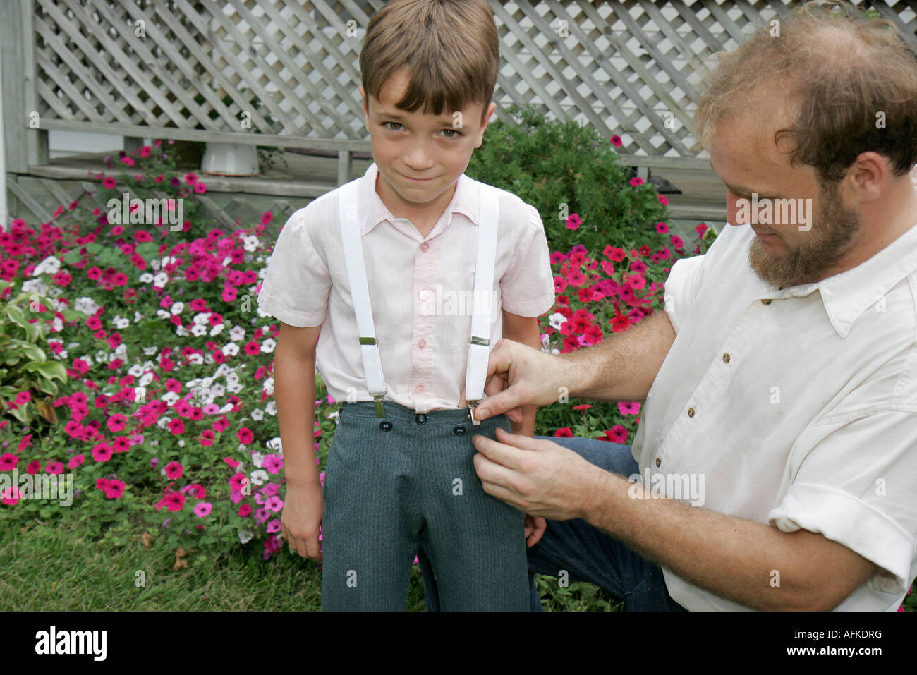 Indiana Shipshewana Amish Farm Tour boy suspenders father Stock Photo 13969251 Alamy