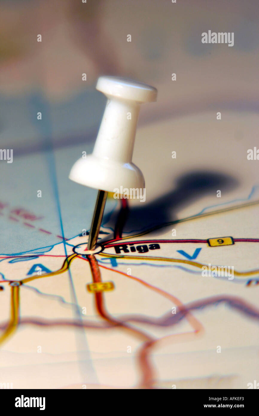 Map Pin pointing to Riga on a road map Stock Photo