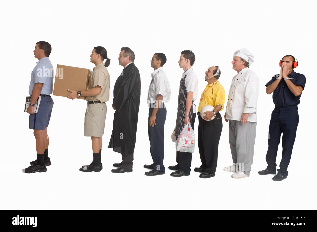 Group of men of different professions standing in line Stock Photo