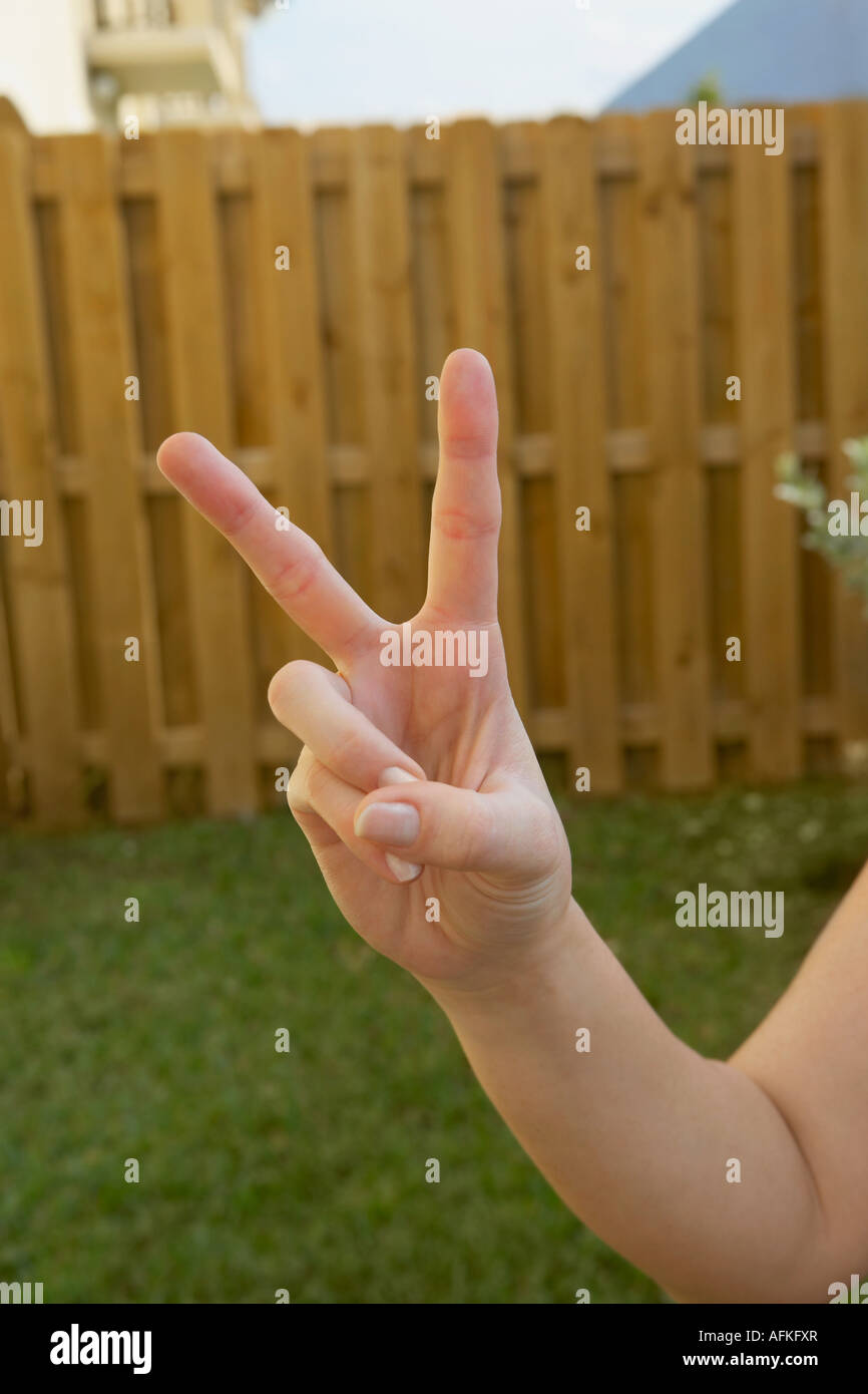 People making a peace sign hi-res stock photography and images - Alamy