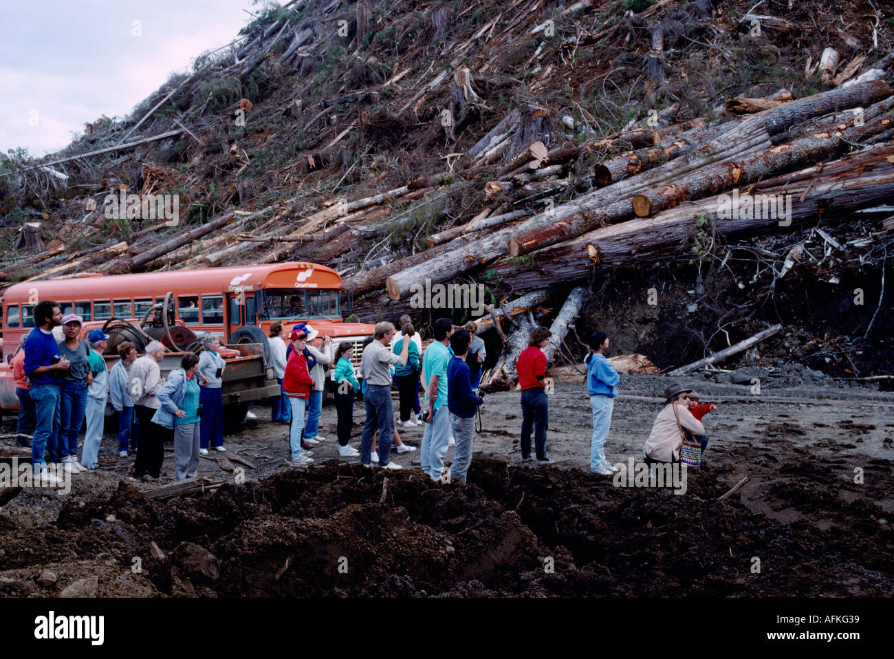 Visitors touring an Active Logging Site on Moresby Island in the Queen Charlotte Islands in British Columbia Canada Stock Photo