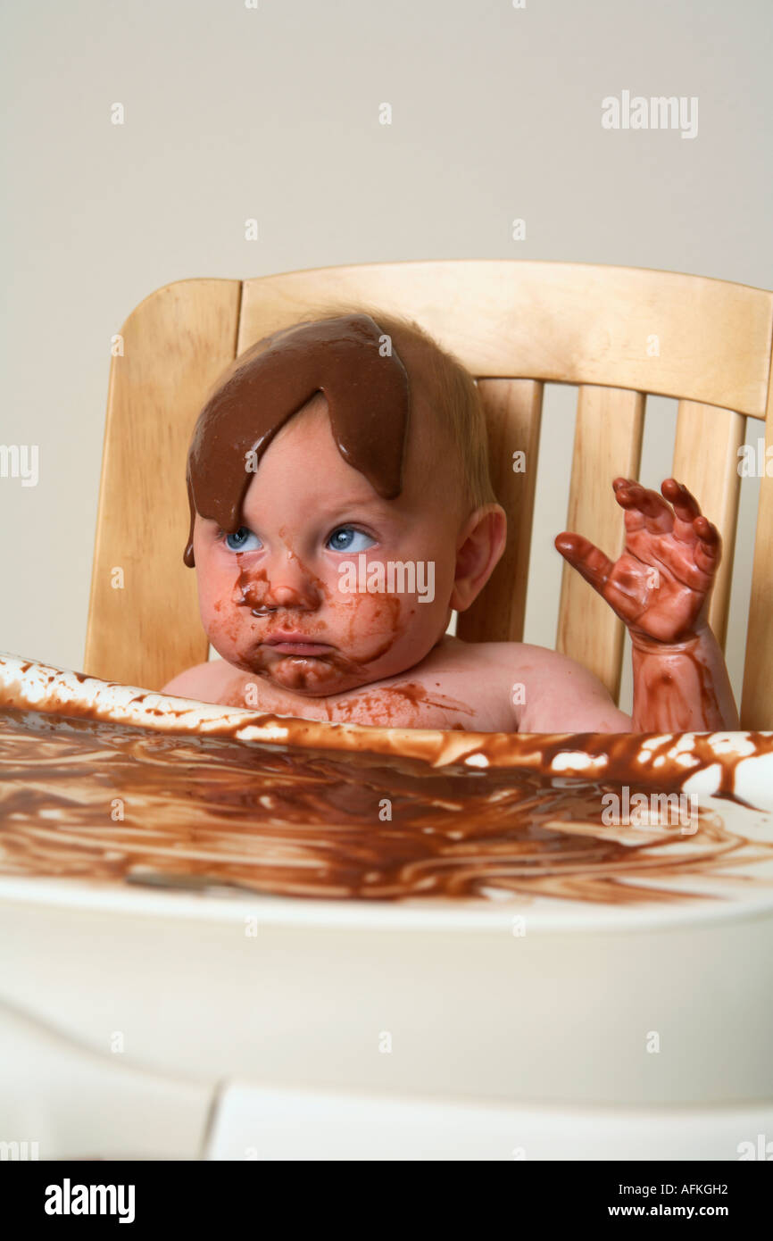 baby-in-highchair-making-mess-with-choco