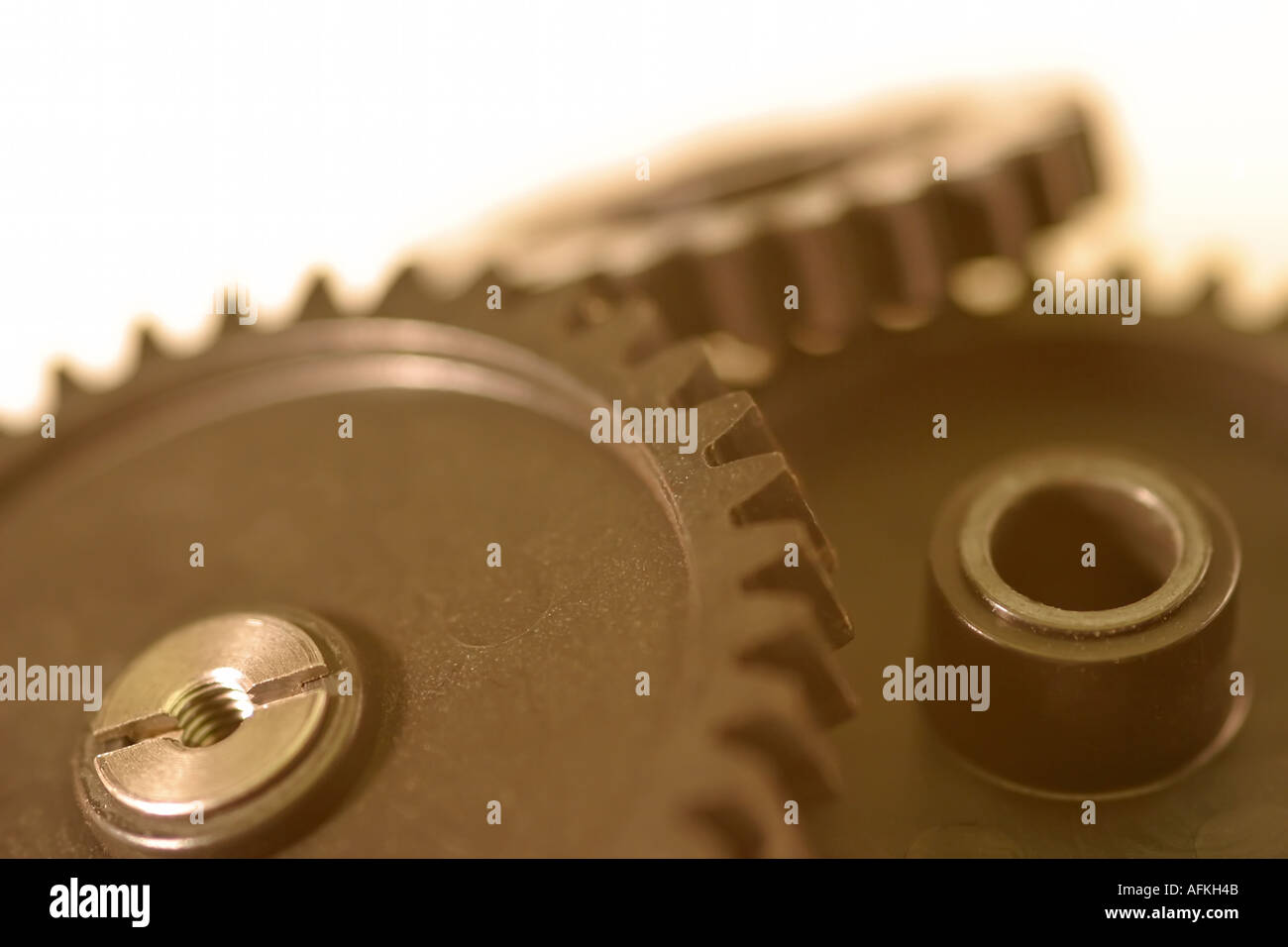 3 cogs piled up, symbolizing disarray, disorganization, machinery system or process out of order Stock Photo