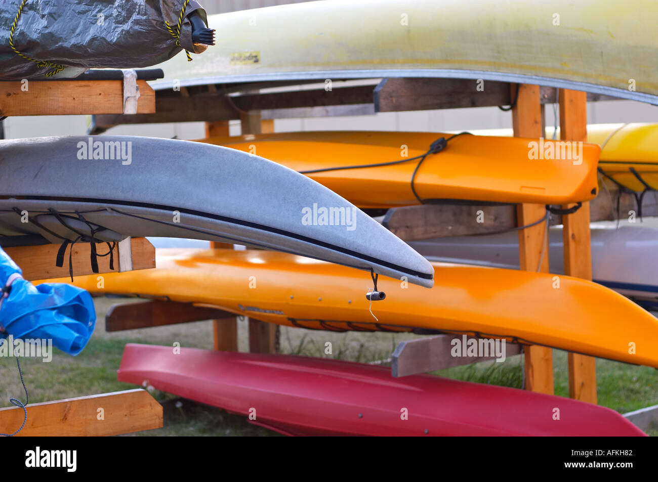 Overturned for drying storage kayaks and canoes Stock Photo