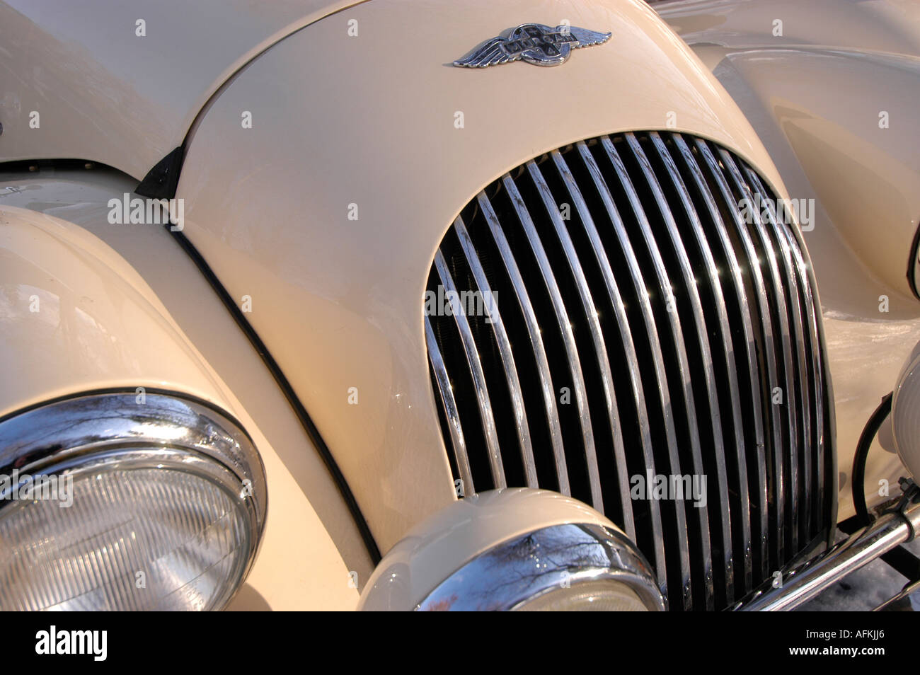 Chrome radiator grill and headlamps classic british  Morgan car Stock Photo