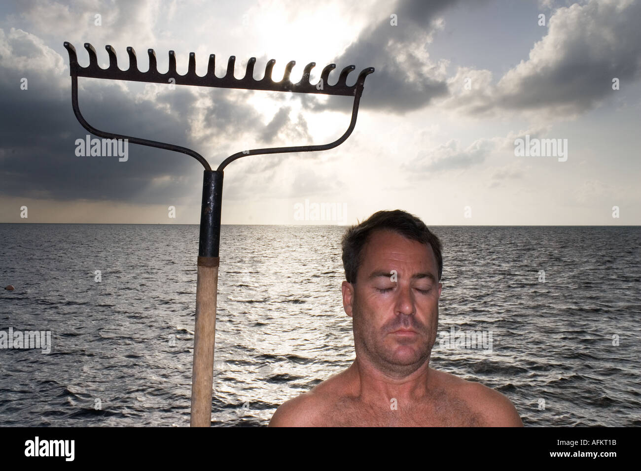 Portrait of a man with his eyes closed and wearing no shirt standing