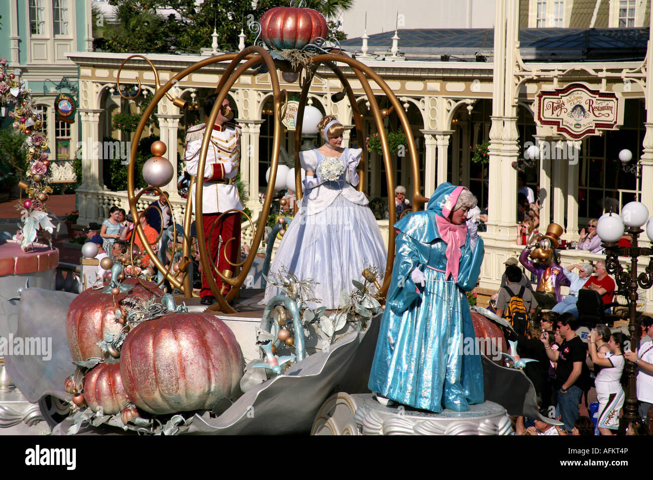Disney characters on a Magic Kingdom afternoon parade at Orlando Florida Cindirella Fairy Godmother and Prince Stock Photo