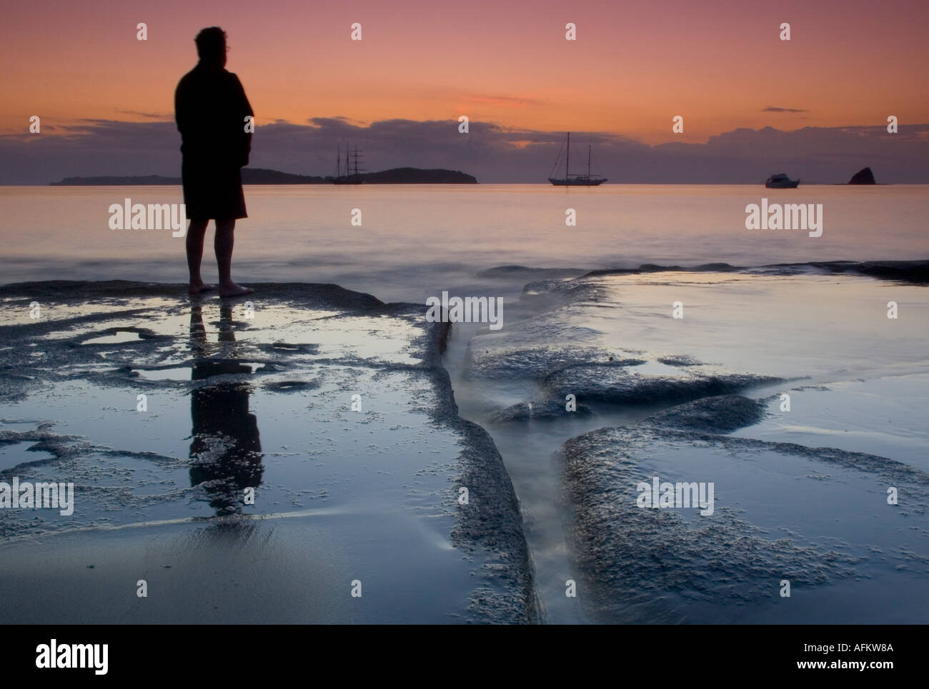Comtemplating dawn at Mahurangi Auckland New Zealand Stock Photo