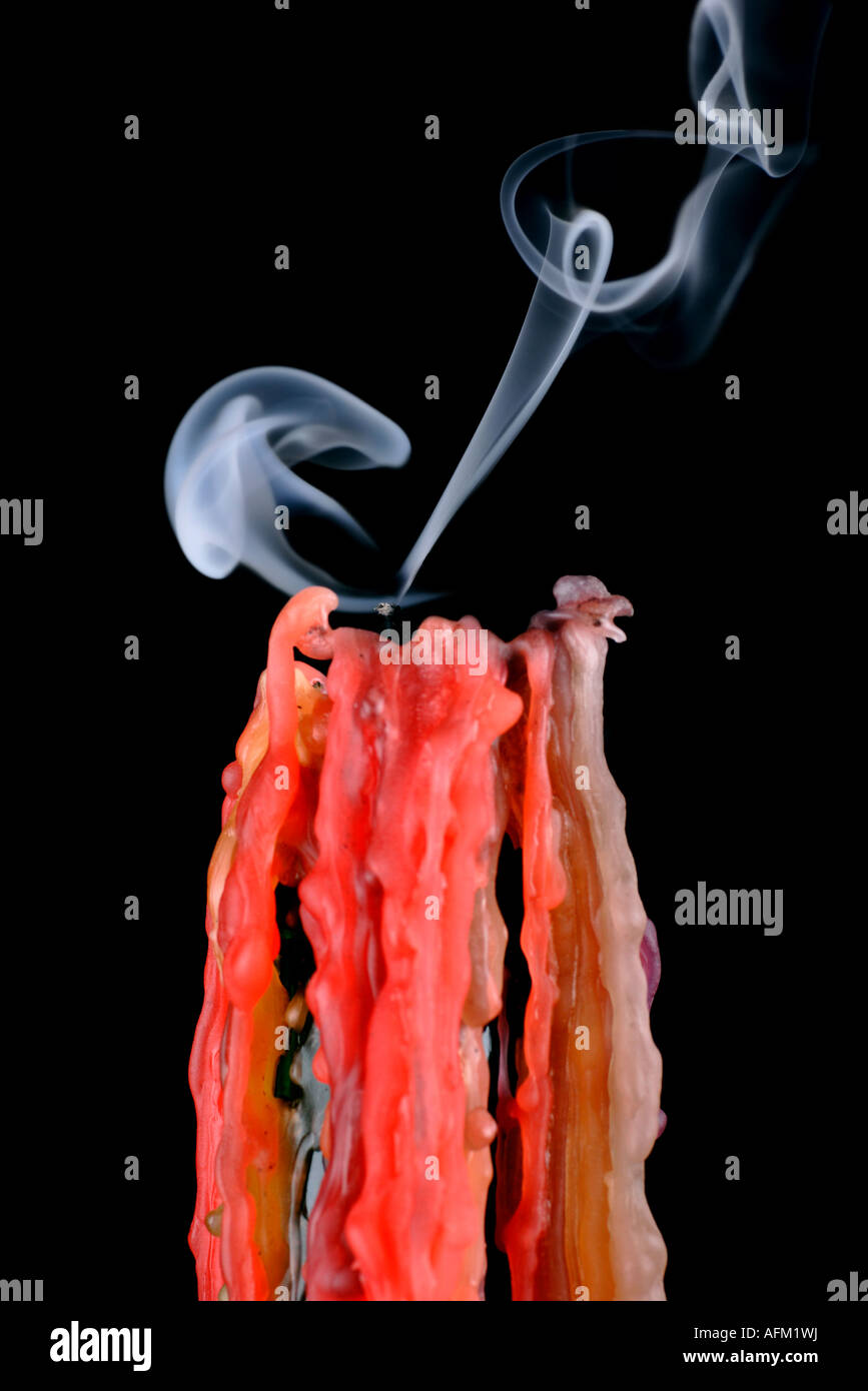 extinguished candle with smoke trails Stock Photo Alamy