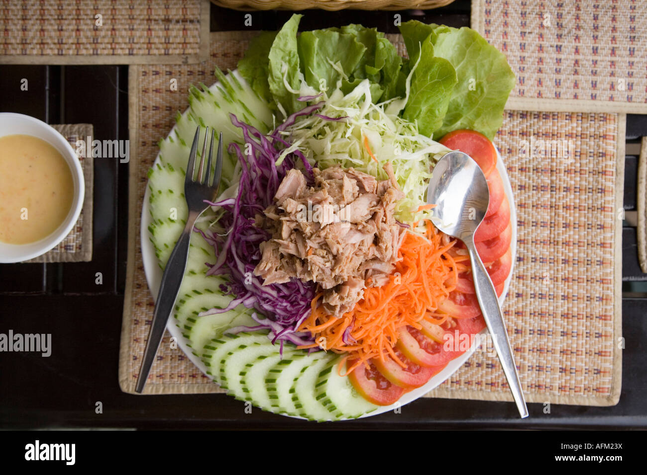 Lao Tuna salad meal, with dressing, served in Vientiane, Laos Stock