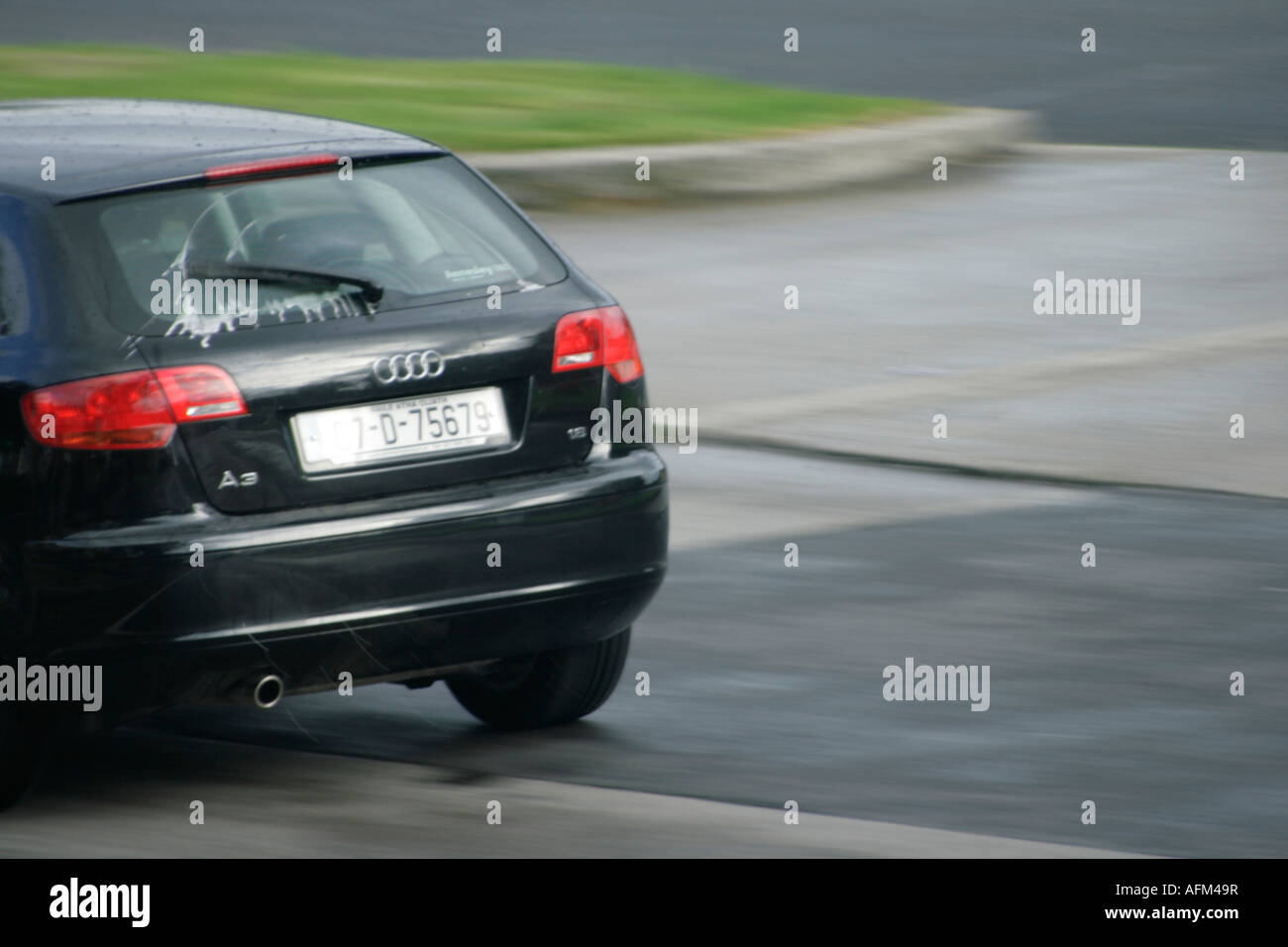 Black Audi A4 travelling at speed with back window wiper on Stock Photo Alamy