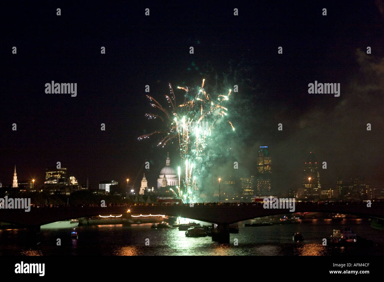 Lord Mayors Show fireworks display on River Thames with City of London and St Pauls Cathedral in background Stock Photo