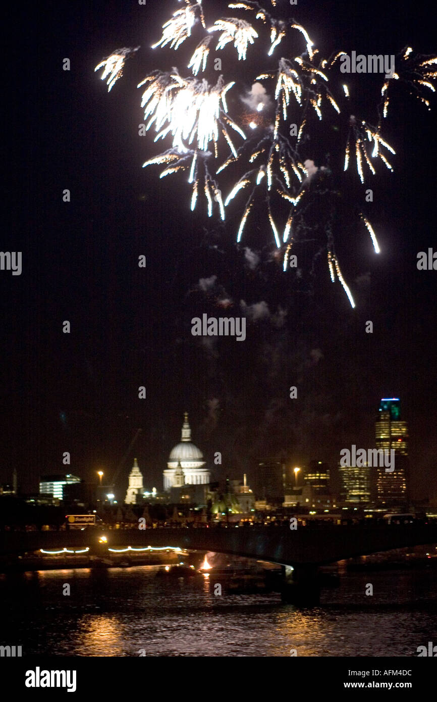 Lord Mayors Show fireworks on River Thames with City of London and St Pauls Cathedral in background Stock Photo