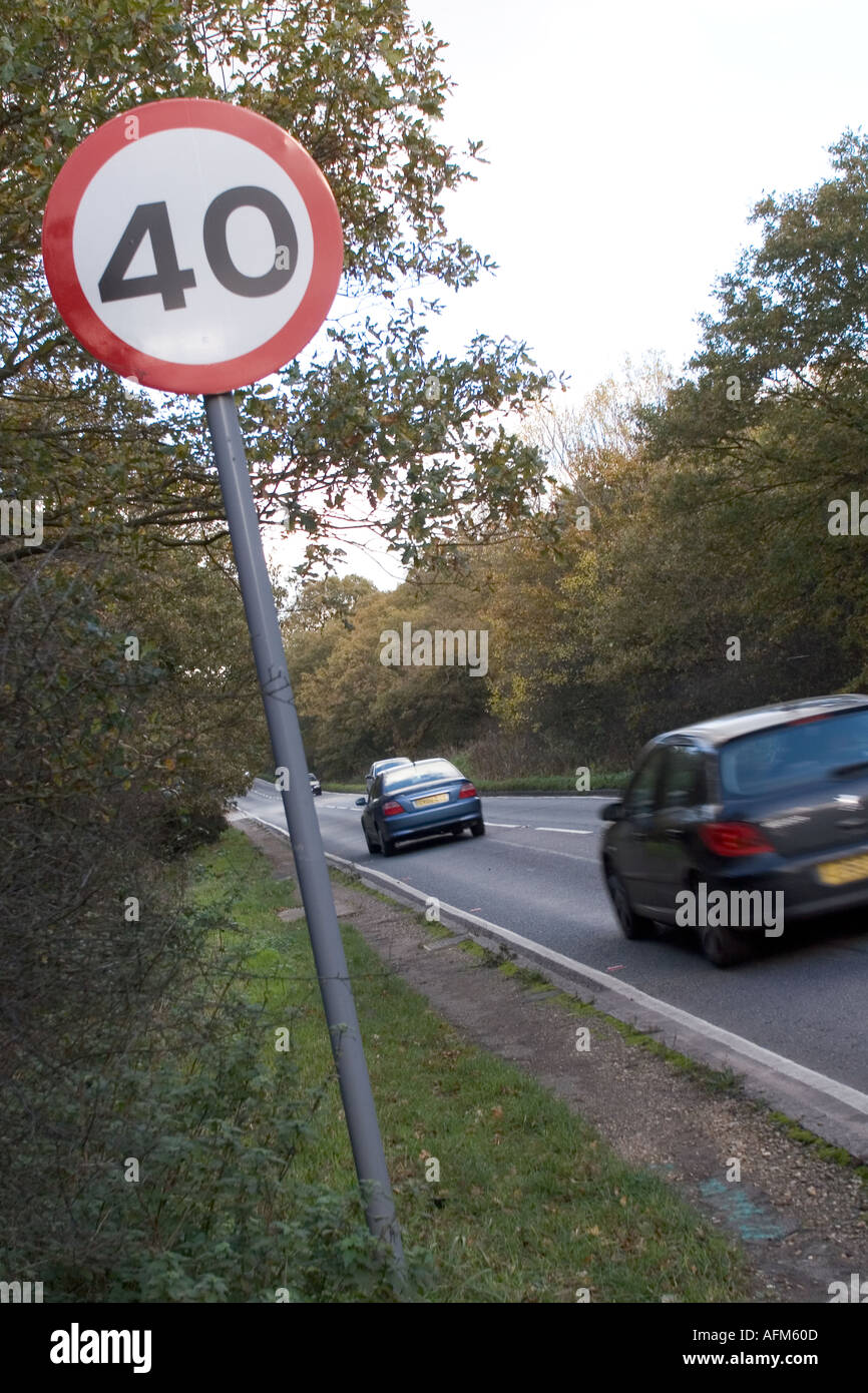 40 mph speed limit sign with cars passing Stock Photo