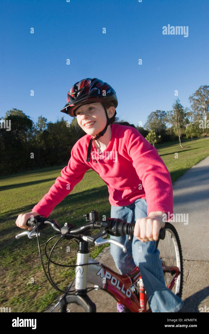 9 year old girl on a bicycle, Brisbane, Australia Stock Photo