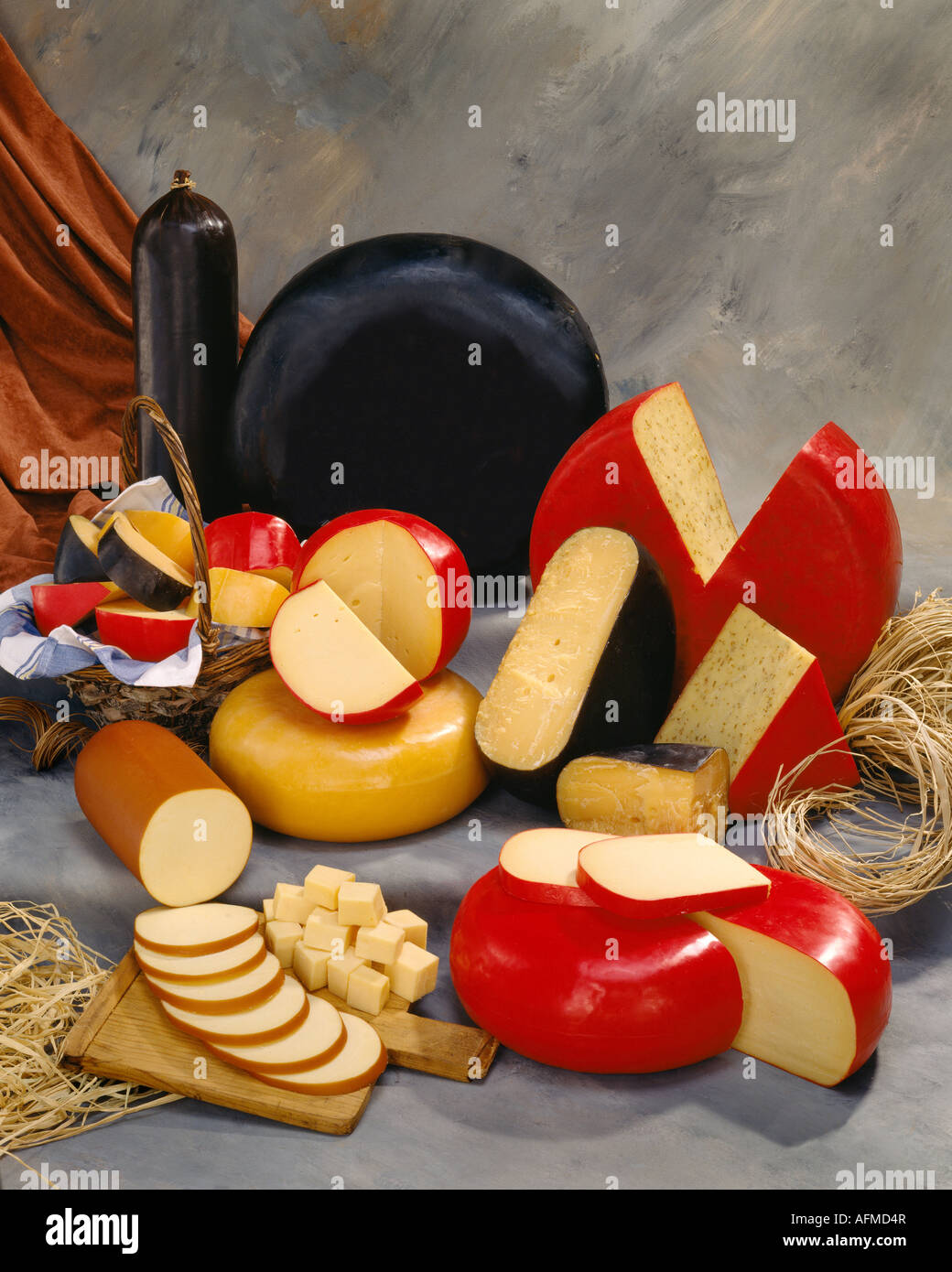 Holland Dutch Cheeses in group color photograph on warm toned mottled ...