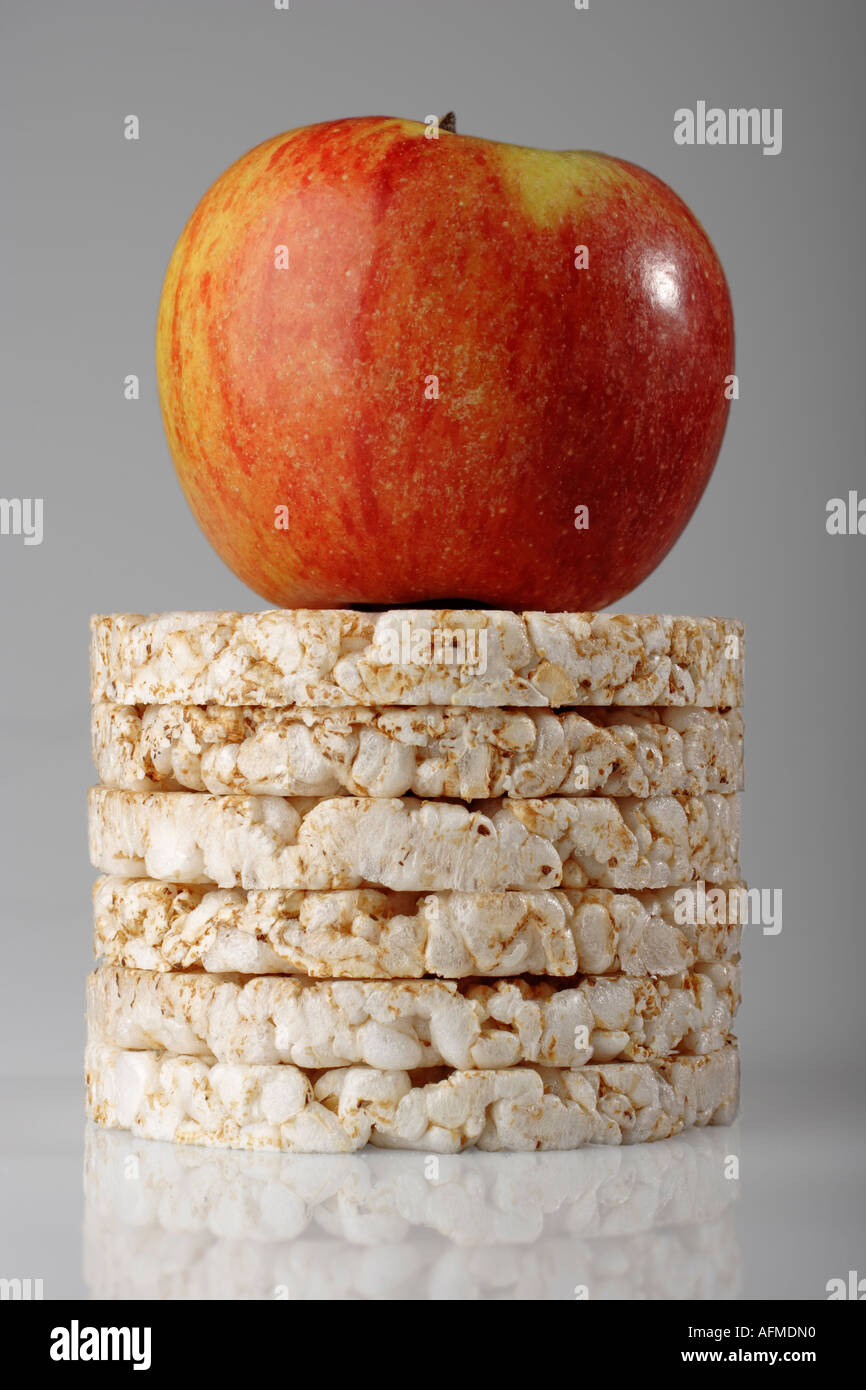 Single apple with rice cakes, diet, healthy eating, low calorie Stock