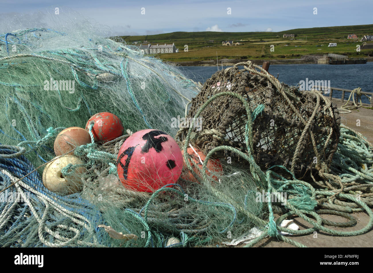 Bouys in Fishing Net Stock Photo Alamy