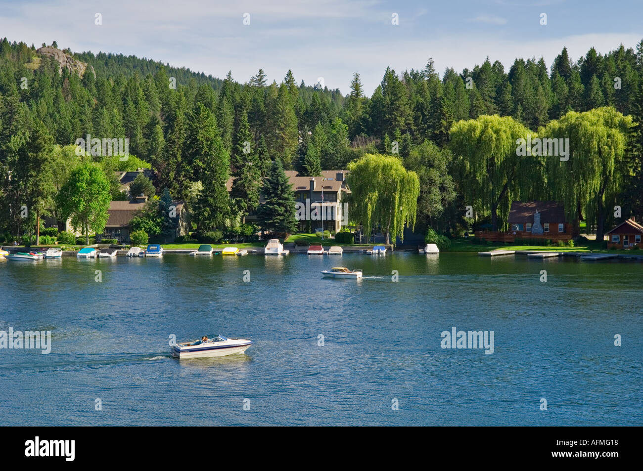Boats and vacation homes on bay in town of Bigfork Flathead Valley