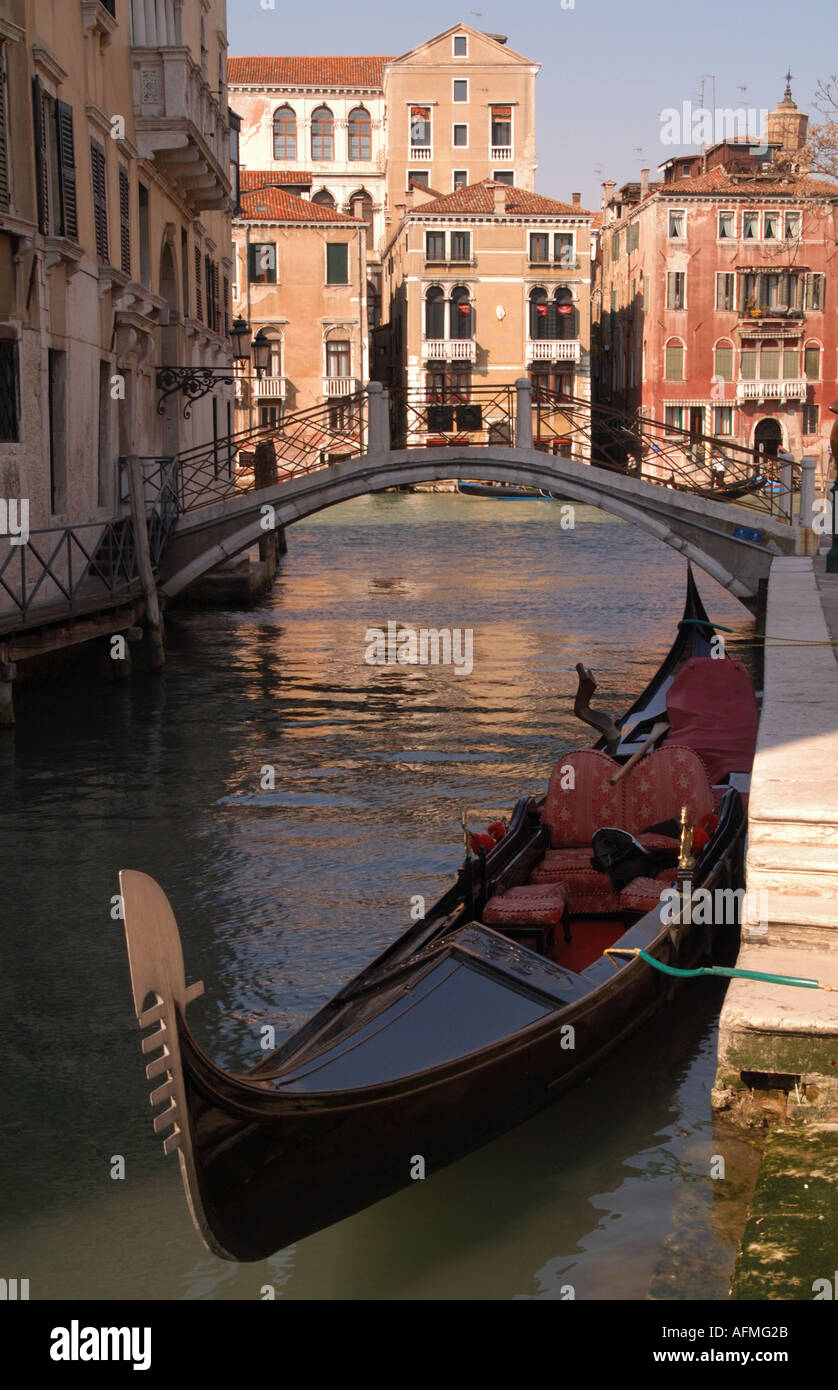 Gondola tied up in a quiet backwater Venice Italy Stock Photo - Alamy