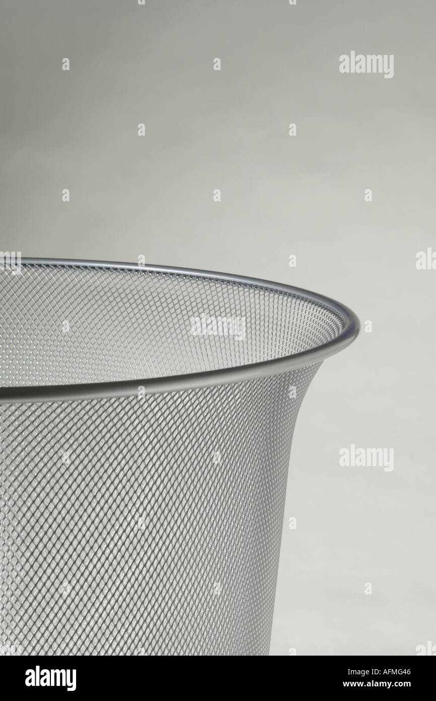 Office waste paper basket bin on plain background Stock Photo Alamy