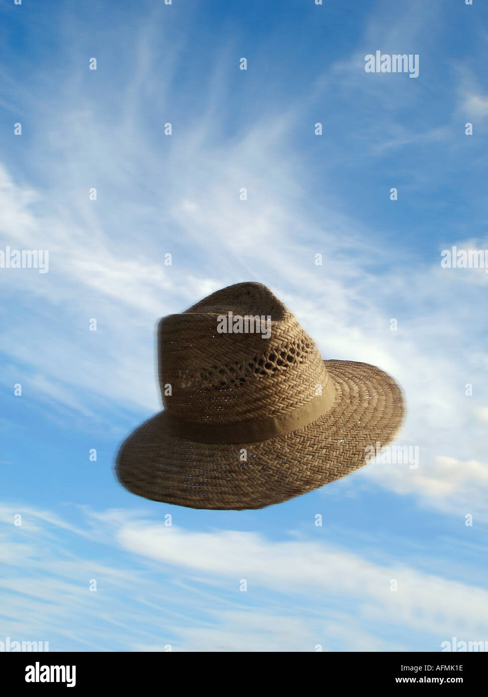 thrown straw hat geworfener Strohhut Stock Photo