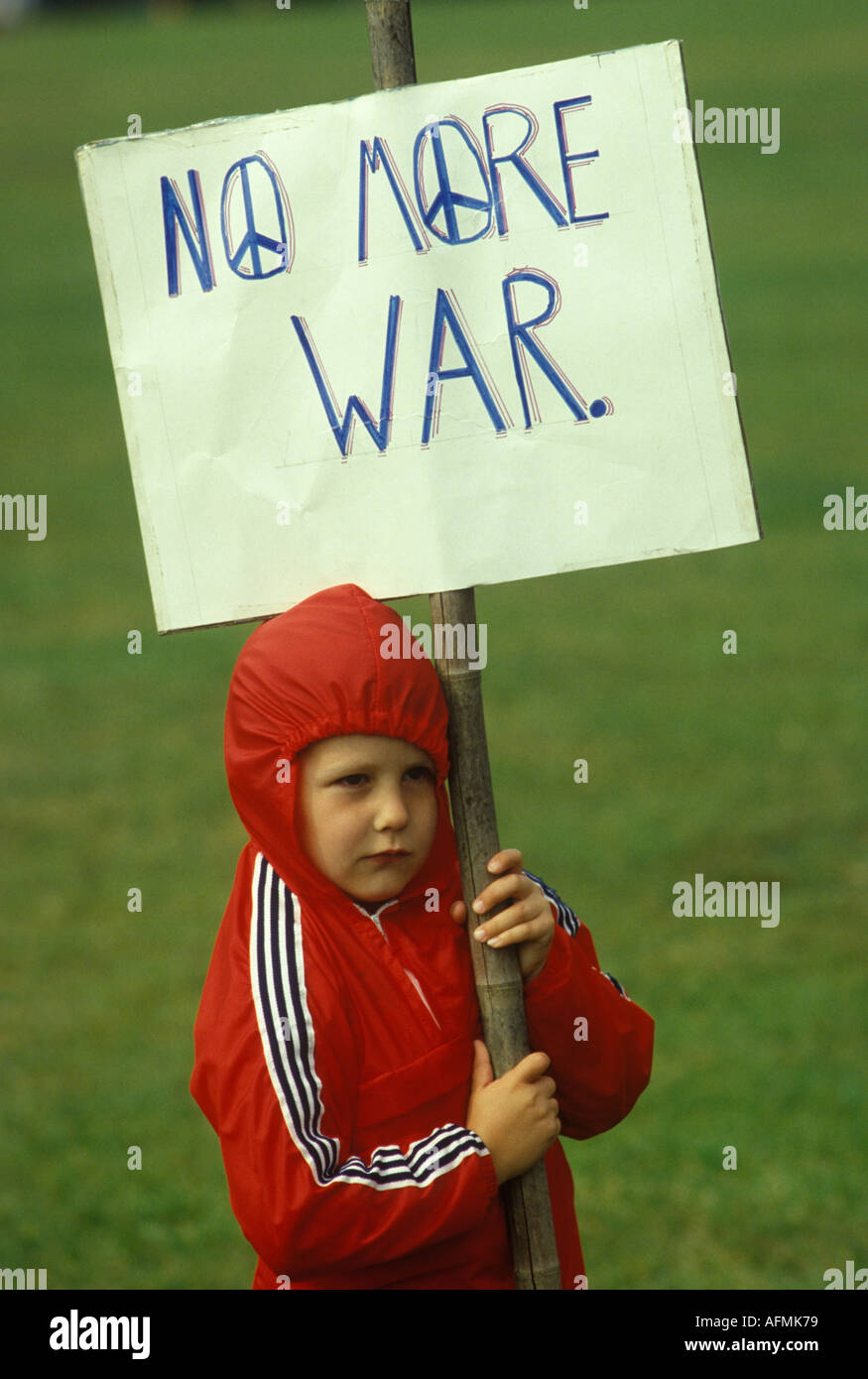 Child at political protest 1980s Labour Party march and rally "Nuclear Arms No Peace Yes"  demonstration London 1982 HOMER SYKES Stock Photo