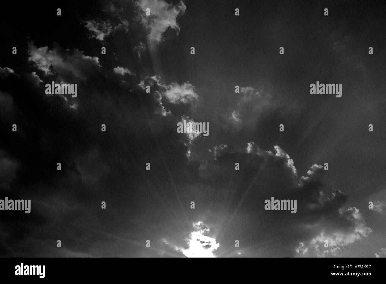 The sun through the clouds Black and White Stock Photos & Images - Alamy