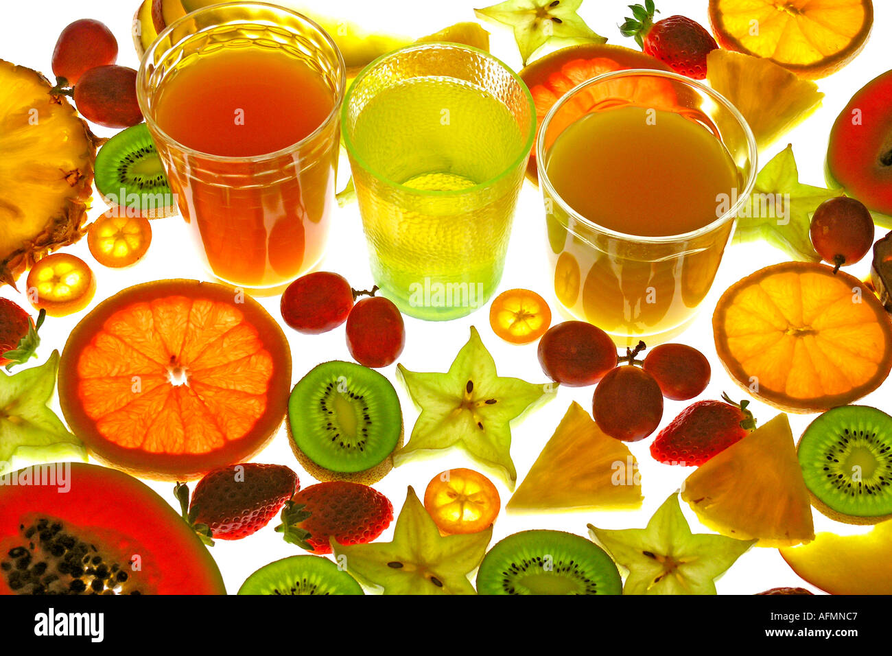 Sliced fruits and juice Stock Photo