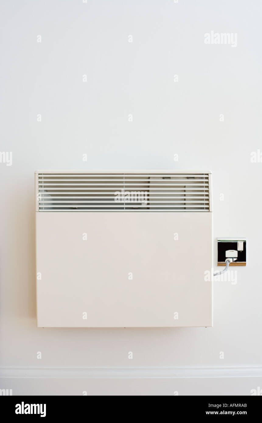 Wall Mounted Convection Radiator and Power Point Stock Photo Alamy