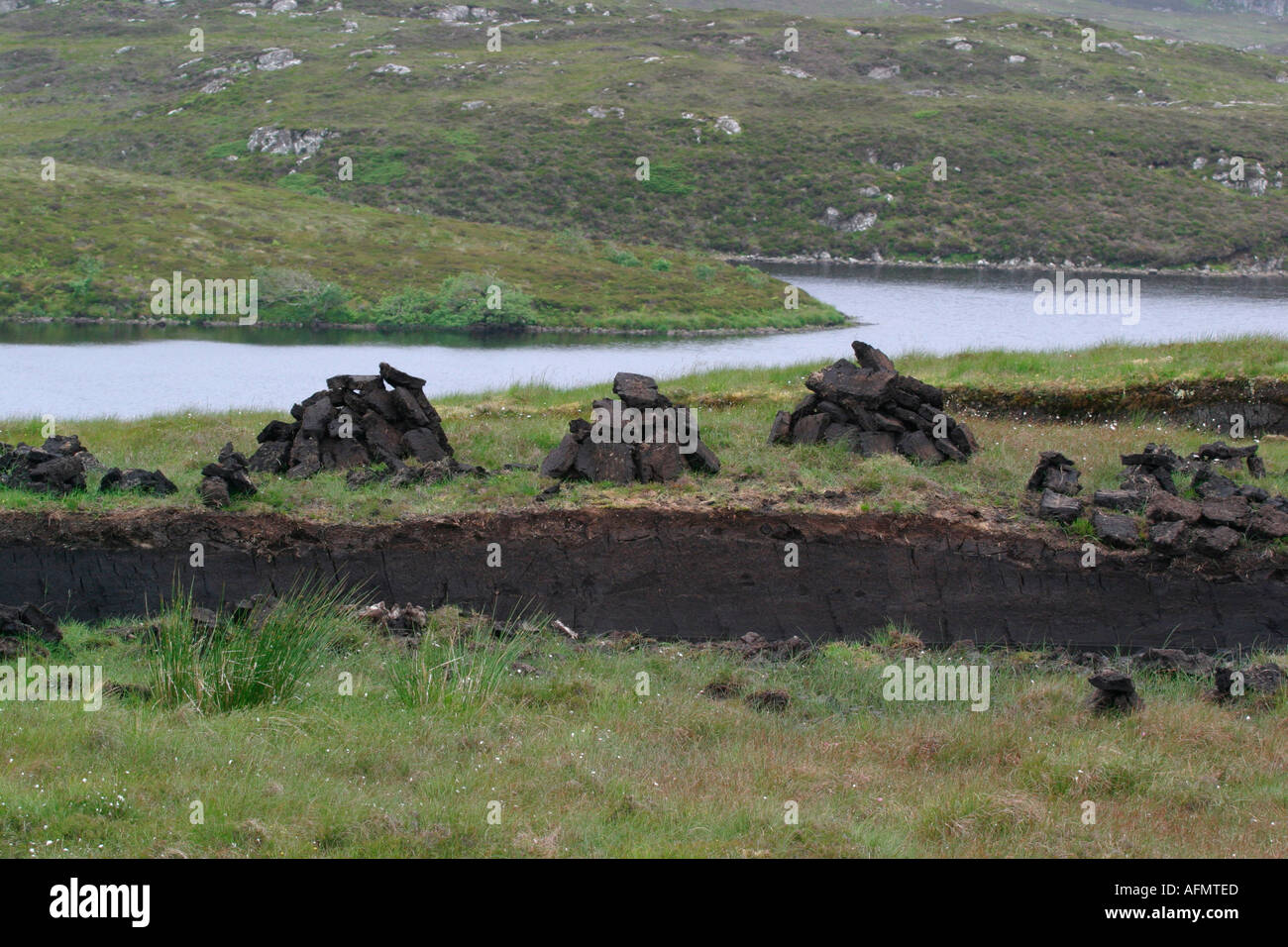 Peat stacks in the Isle of Lewis Stock Photo - Alamy