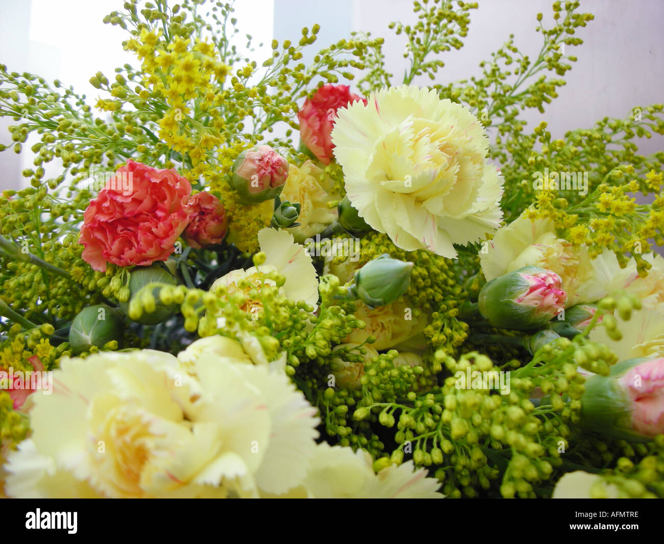 commercial flower arrangement of various colours at florist's Stock Photo