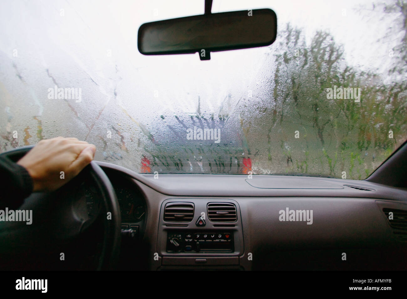 Damp windshield above car interior and dashboard Stock Photo Alamy
