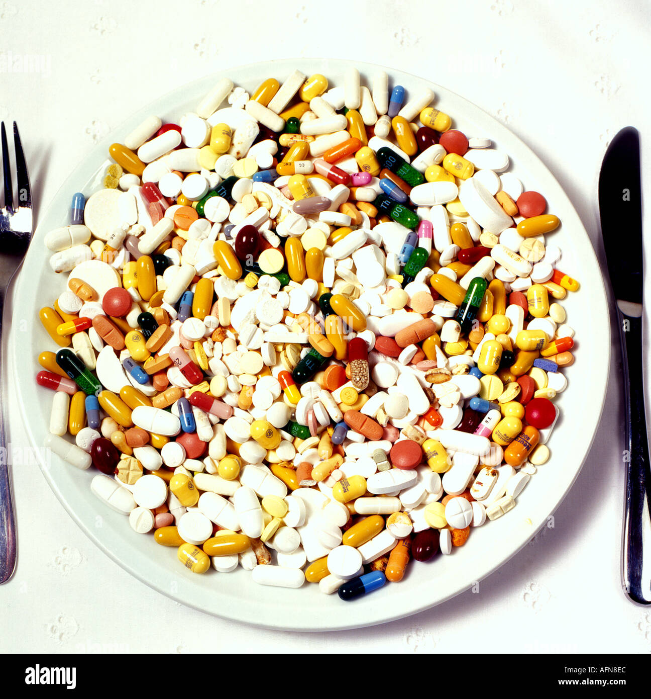 medicine pills on plate. Photo by Willy Matheisl Stock Photo