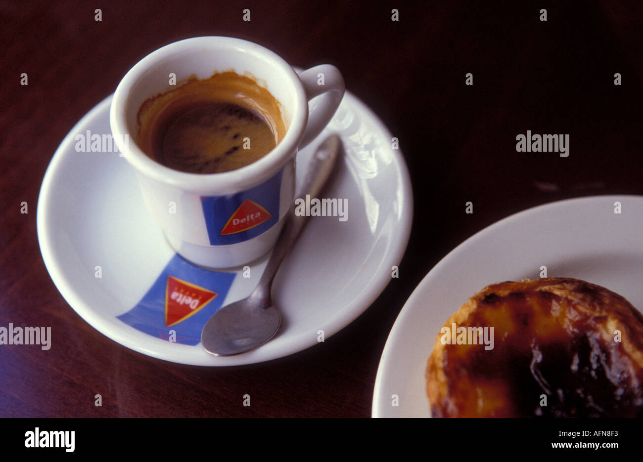 Portugal Lisbon Cup of coffee and a traditional pasteis de Belem cake