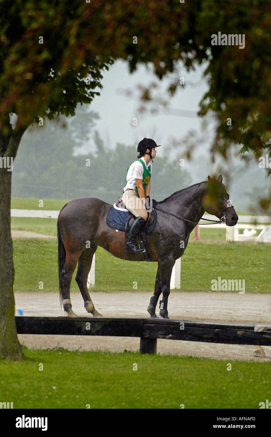Portrait of a female contestant with her horse at an Equestrian event