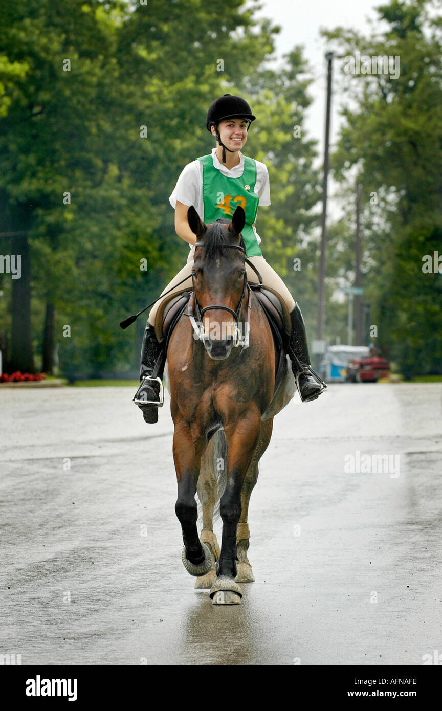 Portrait of a female contestant with her horse at an Equestrian event